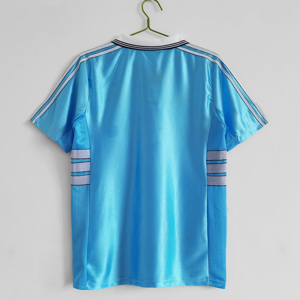 Maillot extérieur rétro 1998-1999 de Marseille, modèle Le 12ème, avec logo et design vintage, vue de face.