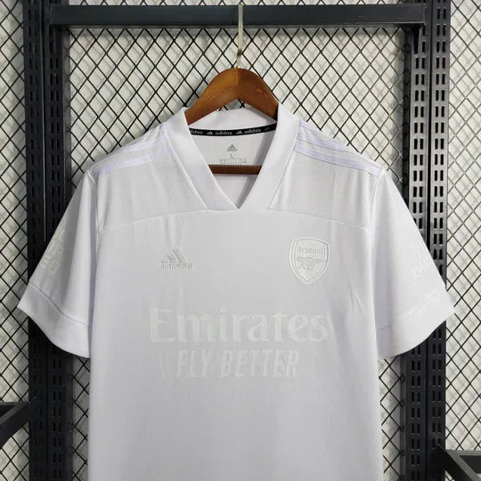 Maillot Arsenal blanc 2021 2022 de la marque Le 12 -ème Maillot, vue de face avec logo et détails du maillot.