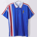 Maillot rétro de football France 1994 domicile, marque Le 12 -ème Maillot, vue de face avec logo et design original.