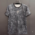 Maillot Portugal 25/26 gris de la marque Le 12 -ème Maillot, vue de face avec logo et détails du tissu gris.