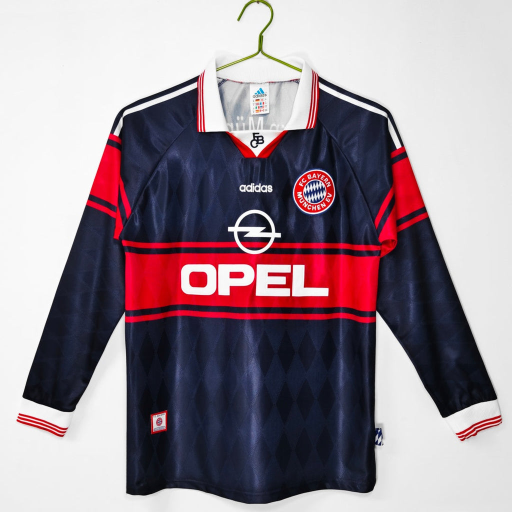 Maillot domicile rétro Bayern Munich 1997-1999 à manches longues, marque Le 12 -ème Maillot, avec logo et détails historiques.