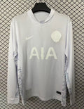 Maillot Tottenham 25/26 édition anniversaire, manches longues, en tissu bleu avec logo et détails dorés, par Le 12 -ème Maillot