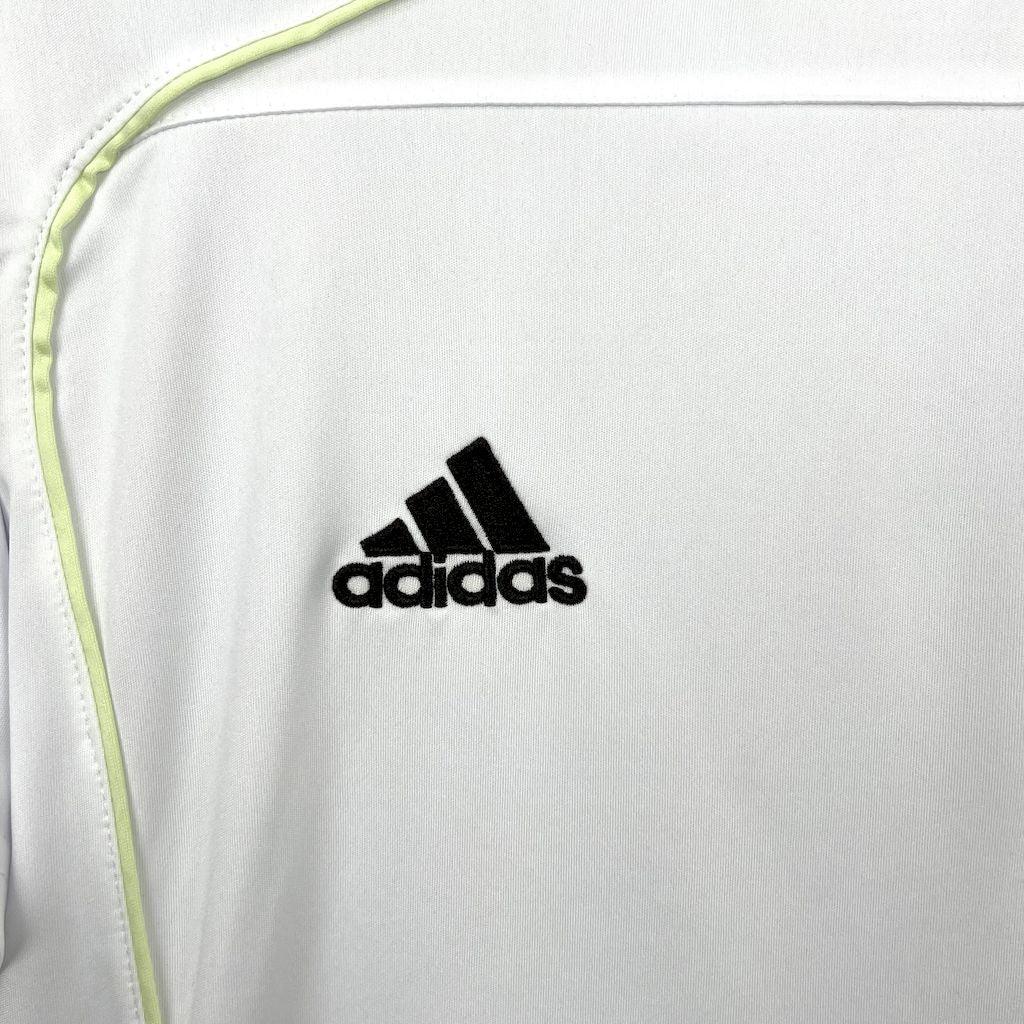 Maillot Real Madrid 2025-26 de la marque Le 12 -ème Maillot, vue de face avec logo et détails du maillot de football.