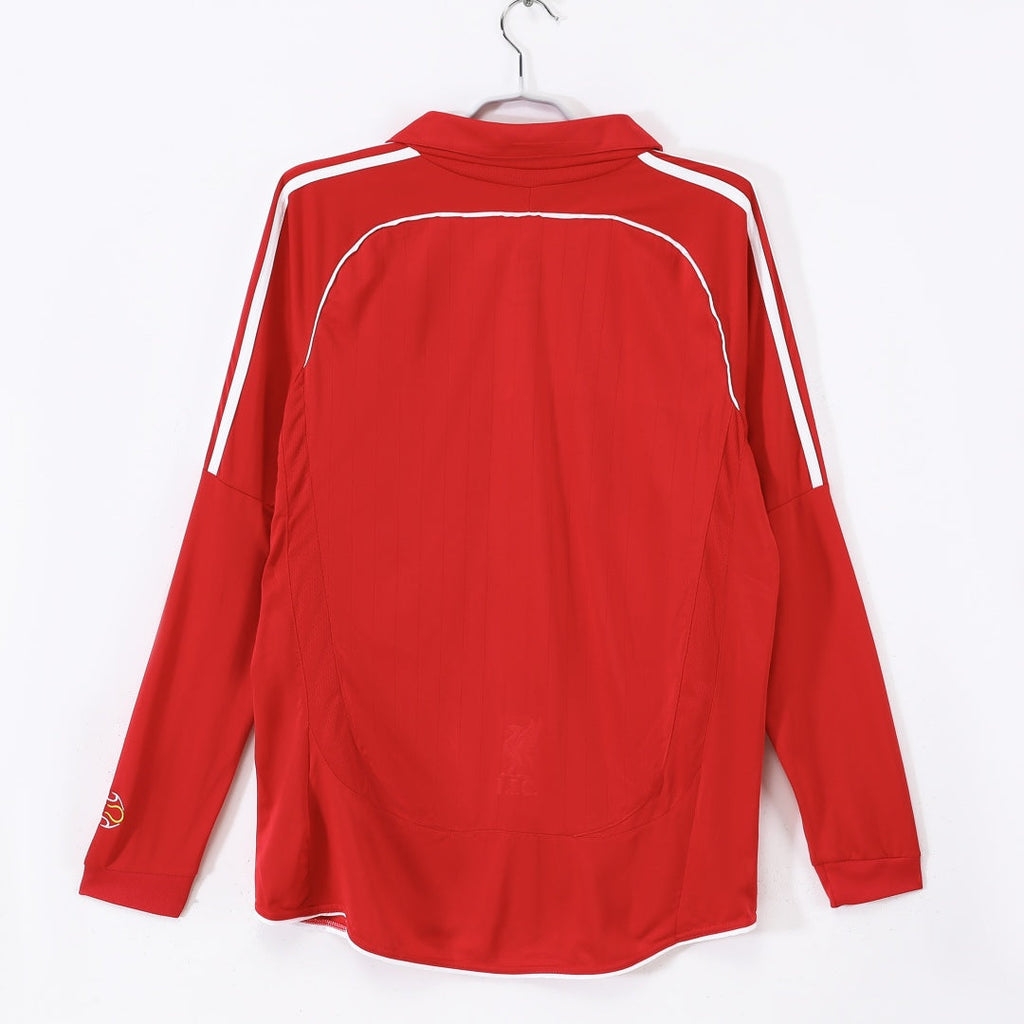 Maillot rétro domicile Liverpool 2006-2007 à manches longues, marque Le 12 -ème Maillot, en bleu avec logo et détails blancs.