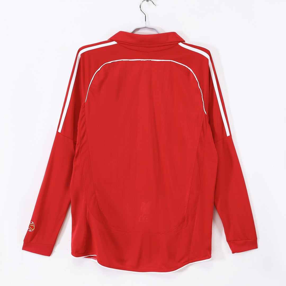 Maillot rétro domicile Liverpool 2006-2007 à manches longues, marque Le 12 -ème Maillot, en bleu avec logo et détails blancs.