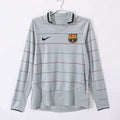 Maillot extérieur rétro de Barcelone 2003-2004 à manches longues, marque Le 12, avec logo du club visible sur le devant.