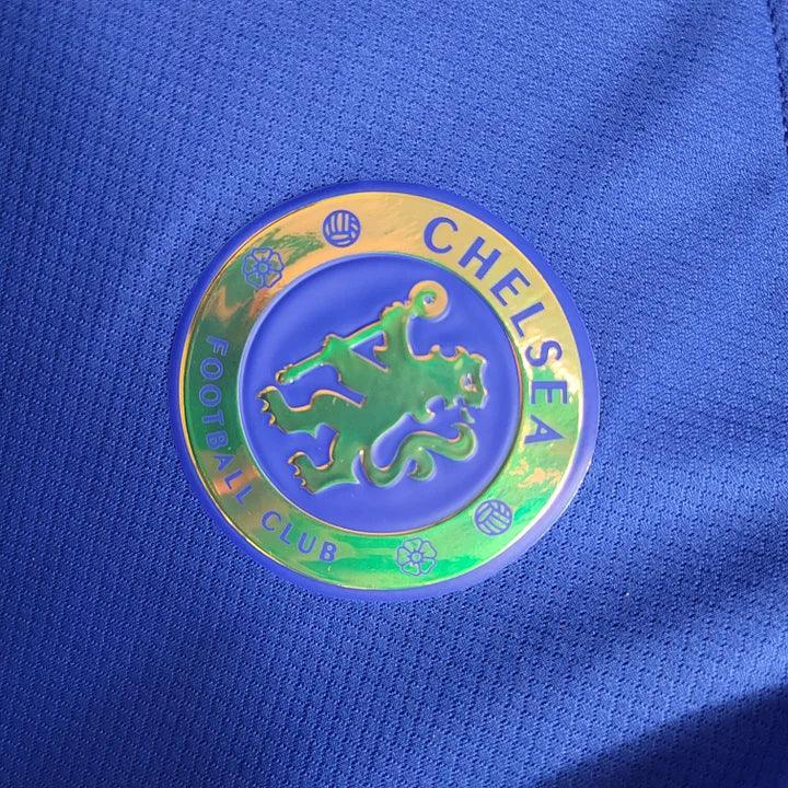 Maillot domicile Chelsea saison 2023-2024 Le 12 -ème Maillot, maillot de football avec logo et couleurs officielles.