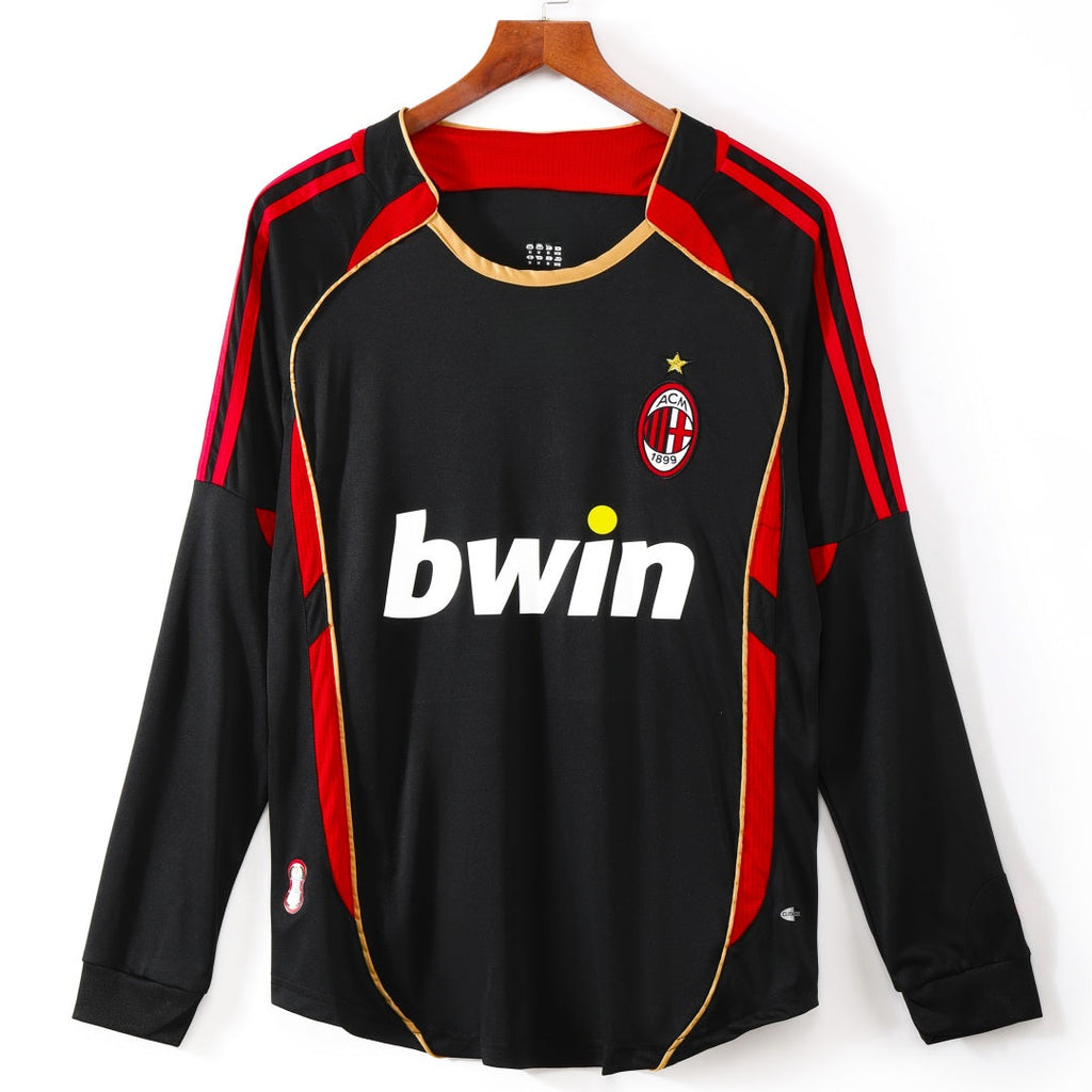 Maillot rétro AC Milan third manches longues 2006-2007, marque Le 12 -ème Maillot, en tissu bleu avec logo et détails rouges