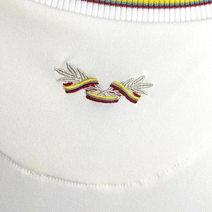Maillot de football Colombie 100ème anniversaire 2024-2025, marque Le 12, devant avec logo et design distinctif.