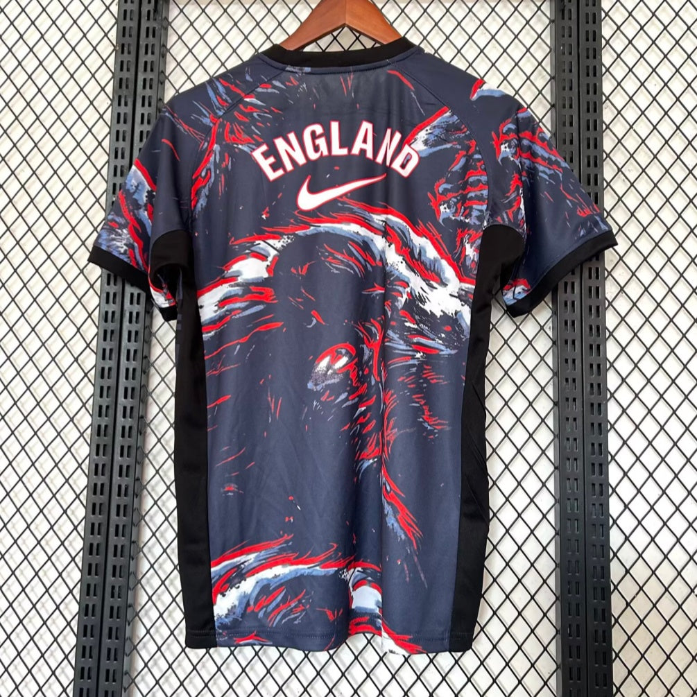 Maillot de gardien de but Angleterre 25/26, marque Le 12 -ème Maillot, avec logo et détails en bleu et blanc.
