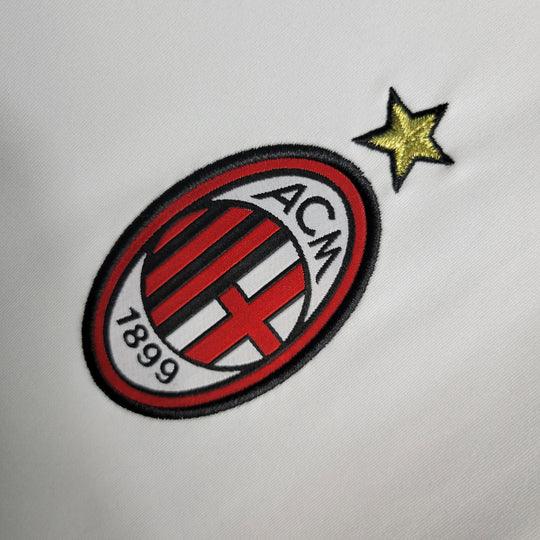 Maillot rétro de l'AC Milan 2009-2010, marque Le 12 -ème Maillot, vue frontale avec logo et design classique rouge et noir