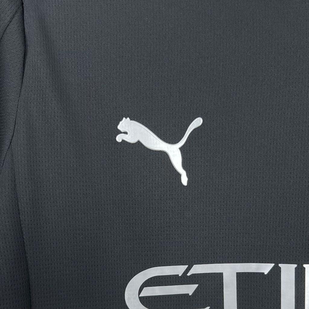 Maillot Manchester City 2025-26 de Le 12 -ème Maillot, vue avant avec logo et motifs de l'équipe de football.