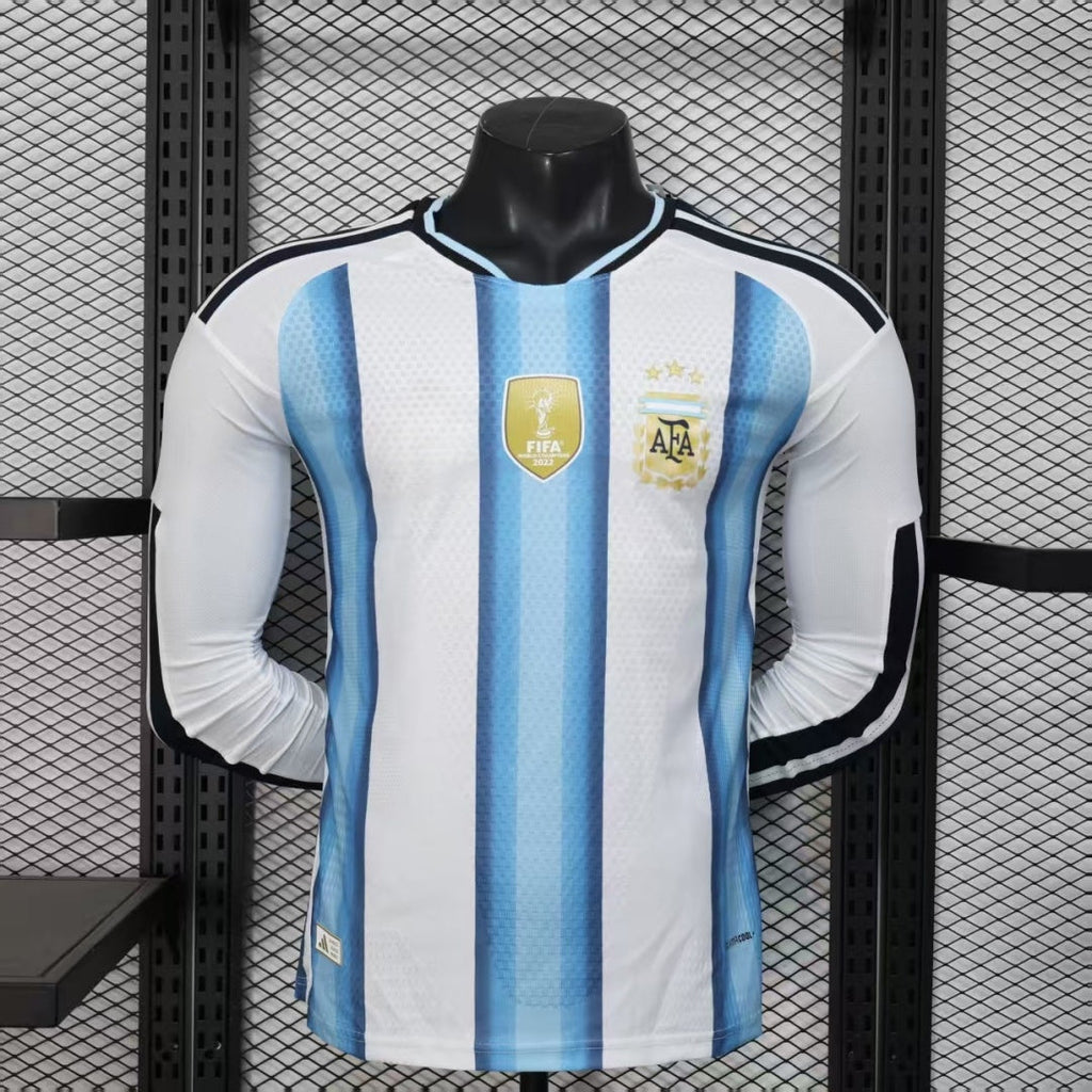Maillot domicile Argentine 25/26 à manches longues, marque Le 12 -ème Maillot, en bleu avec logo national et détails blancs.