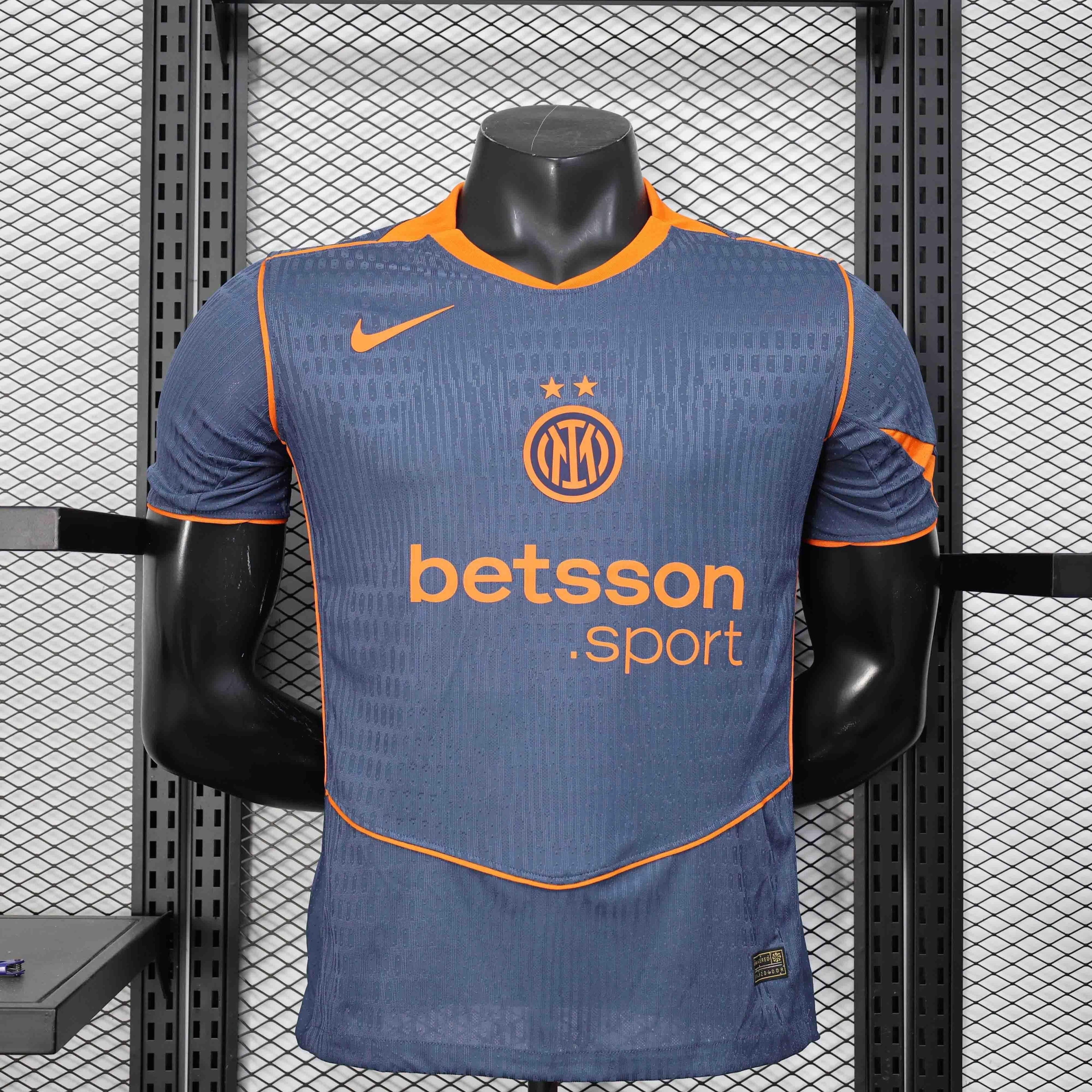 Maillot extérieur de l'Inter Milan 2025-26, marque Le 12-ème Maillot, avec logo du club et design en bleu et noir.