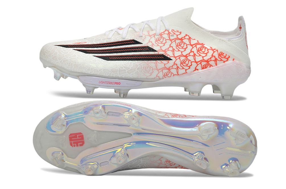 Crampons adidas F50+.1 pour football, semelles en acier, fixation réglable, conçus pour la performance sur terrain en herbe