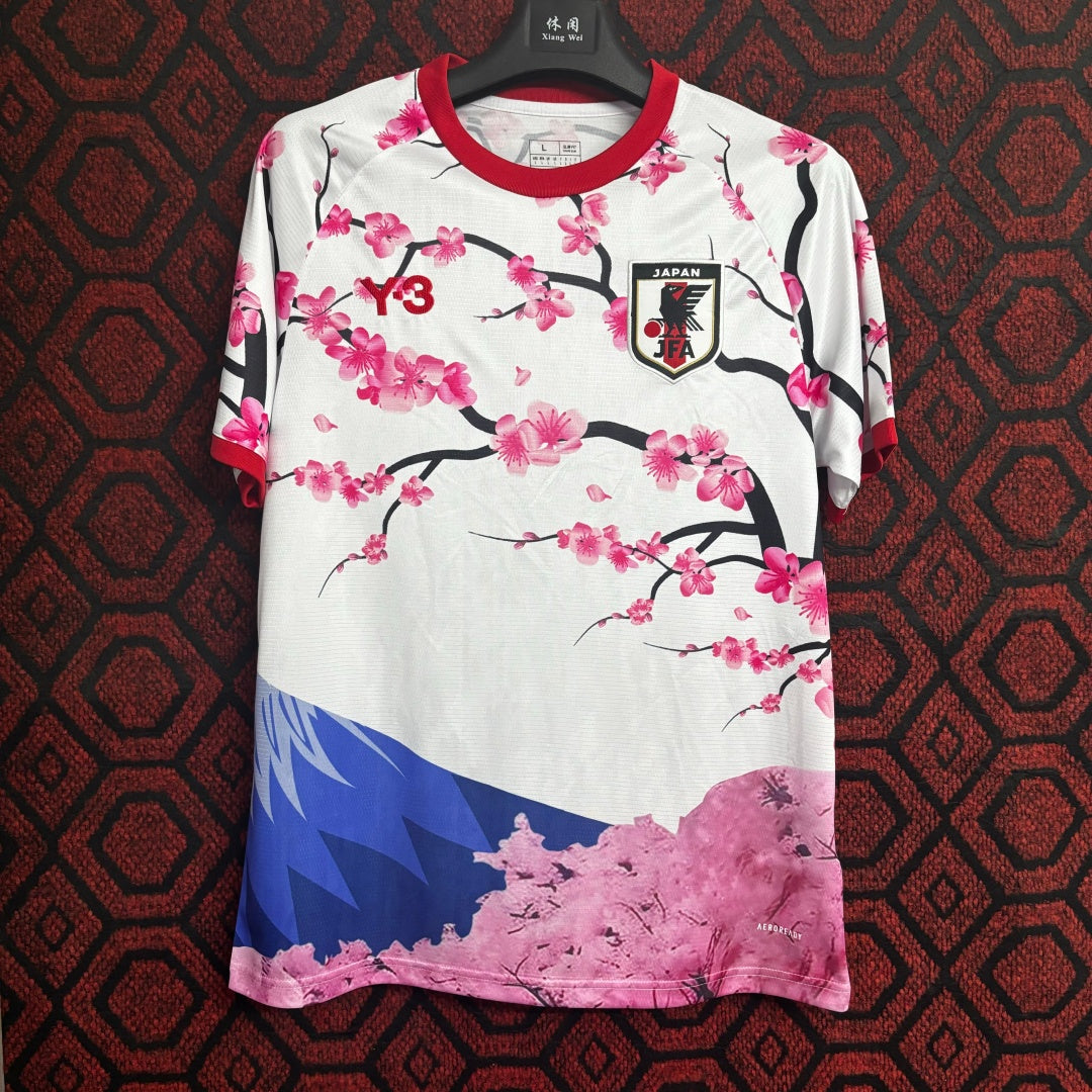 Maillot 25/26 japonais Le 12 -ème avec motif oriental cerise, design coloré et moderne pour sport ou loisirs.