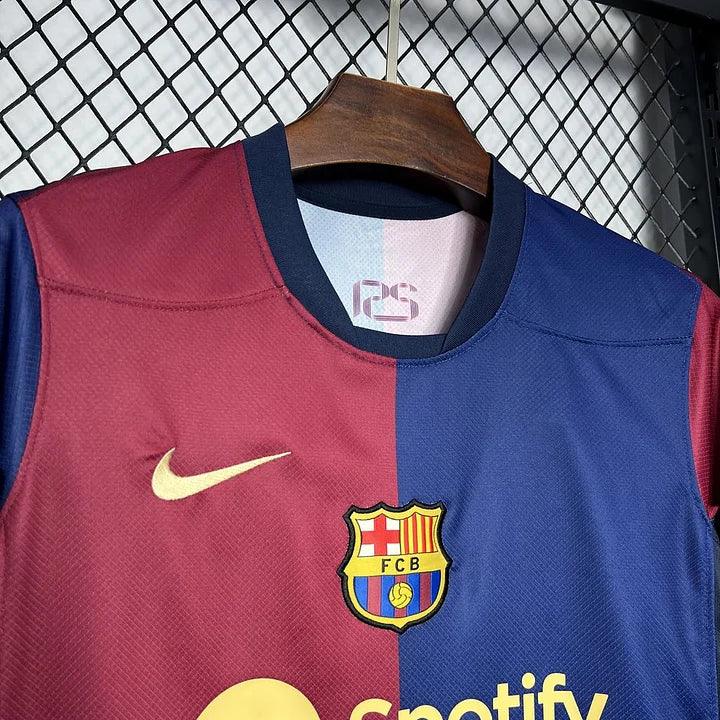 Maillot FC Barcelone 2024/25 Le 12, maillot de football bleu avec logo officiel et détails du club.