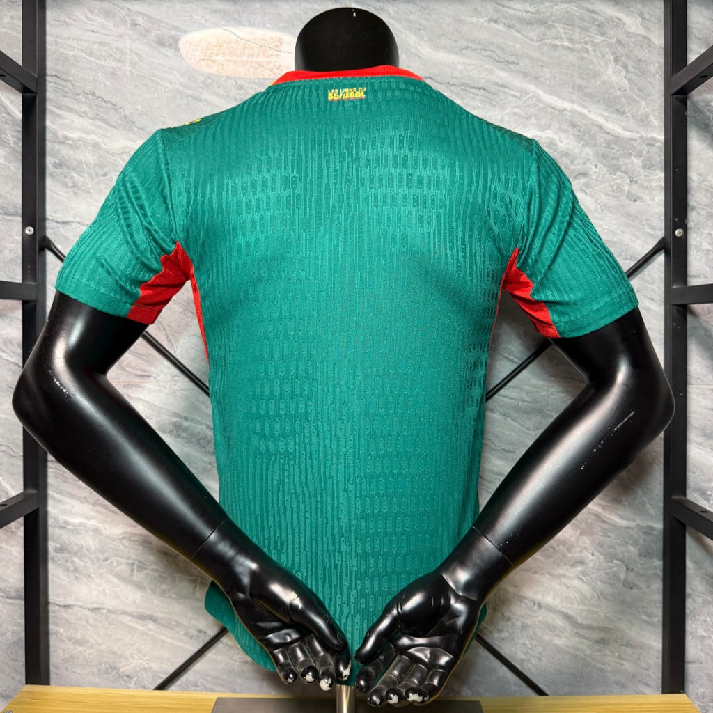 Maillot vert 25/26 du Sénégal de l'équipe, fabriqué par Le 12 -ème Maillot, porté par un joueur.