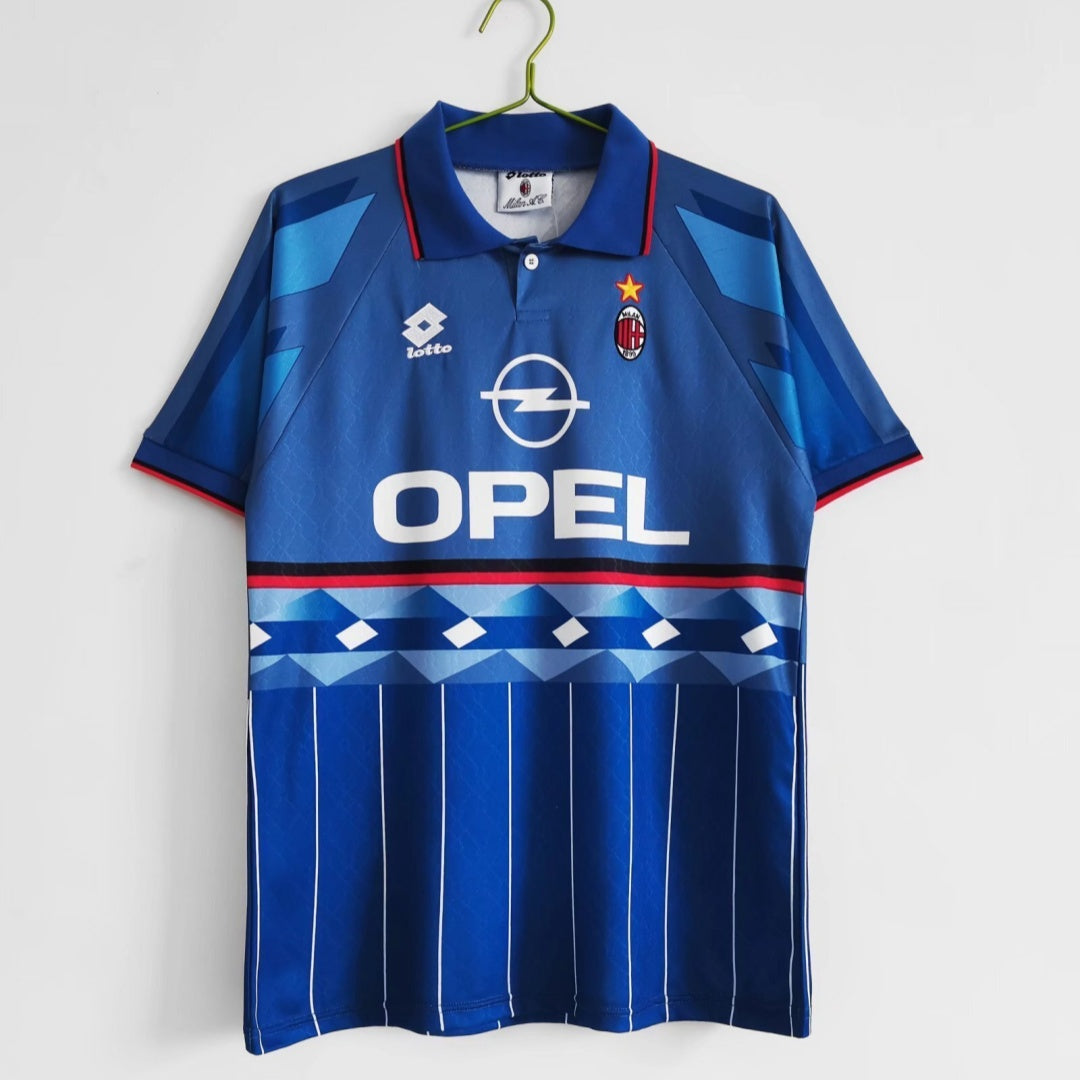 Maillot rétro third de l'AC Milan 1995-1996, marque Le 12, avec le logo et design emblématiques de cette saison.