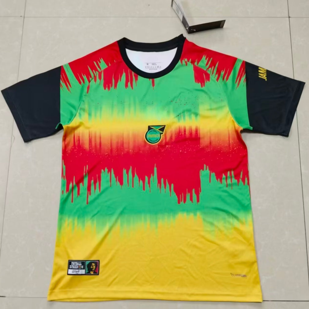 Maillot de football 25/26 Jamaica Le 12 -ème Maillot, jersey coloré avec logo et motifs sportifs visibles.