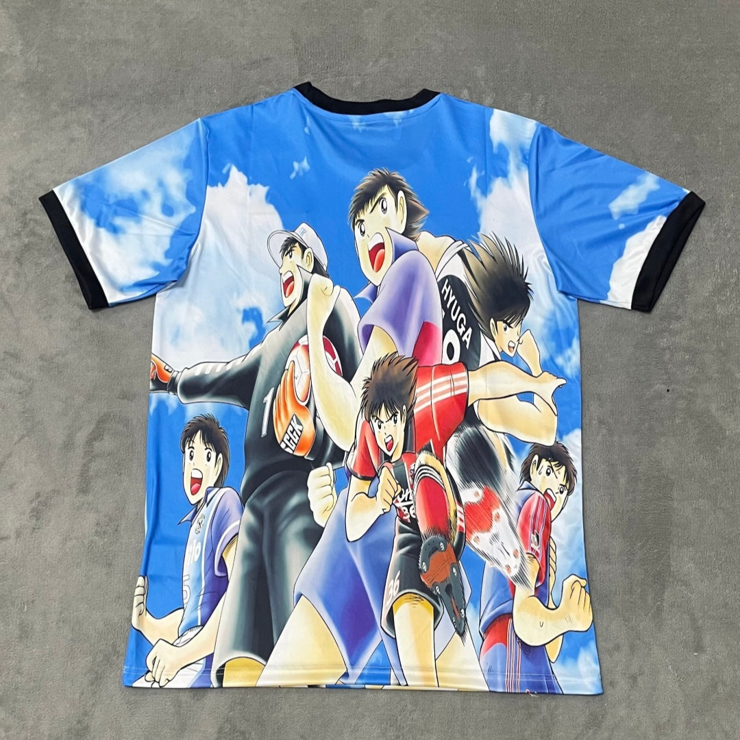 Maillot de soccer Le 12 -ème Maillot, taille 25/26, design anime japonais bleu, illustration spéciale visible sur le devant.
