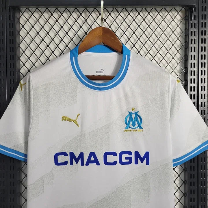 Maillot domicile Olympique de Marseille 2023-2024 de la marque Le 12-ème Maillot, vue de face avec logo et détails du maillot.
