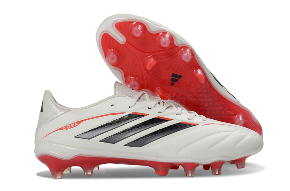 Crampons COPA PURE IV ELITE de Le 12 -ème Maillot, vue de face avec pointes en acier pour alpinisme et escalade.