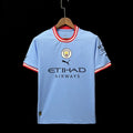 Maillot domicile Manchester City 2022/23 Le 12 -ème Maillot, maillot de football avec logo et design officiel.
