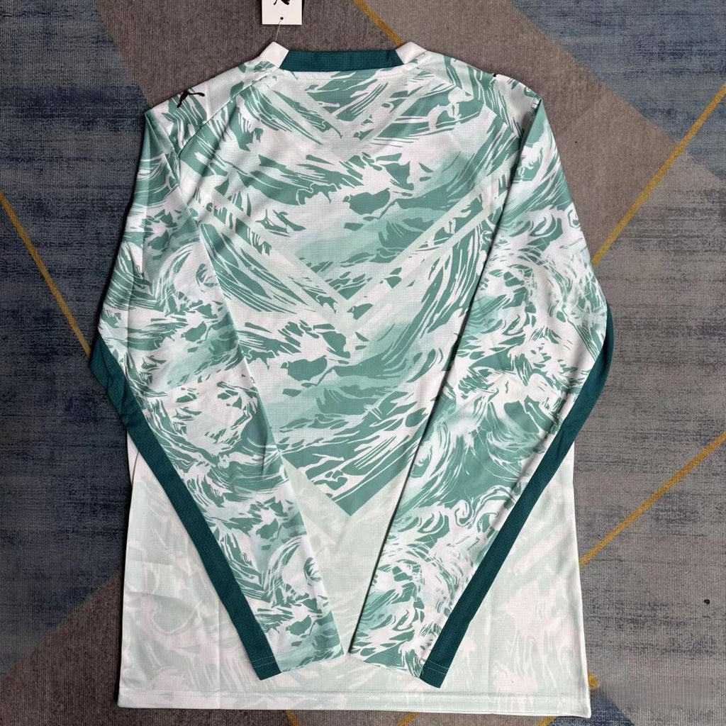 Maillot Portugal extérieur 25/26 à manches longues de la marque Le 12 -ème, tissu bleu avec logo et détails rouges et verts.