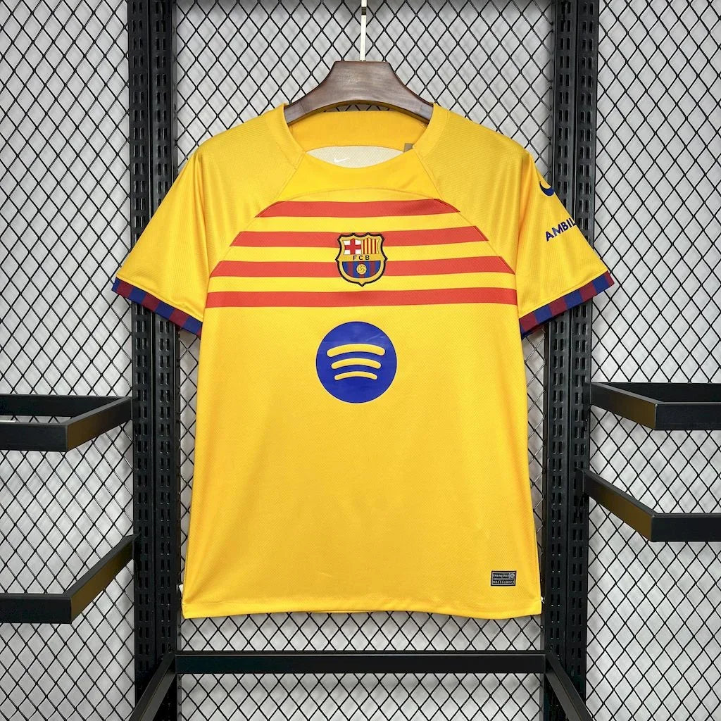 Maillot de football FC Barcelone 2024-2025 troisième version, marque Le 12 -ème Maillot, vue de face avec logo et design moderne