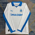 Maillot domicile Marseille 25/26 à manches longues, marque Le 12 -ème Maillot, en bleu avec logo du club.