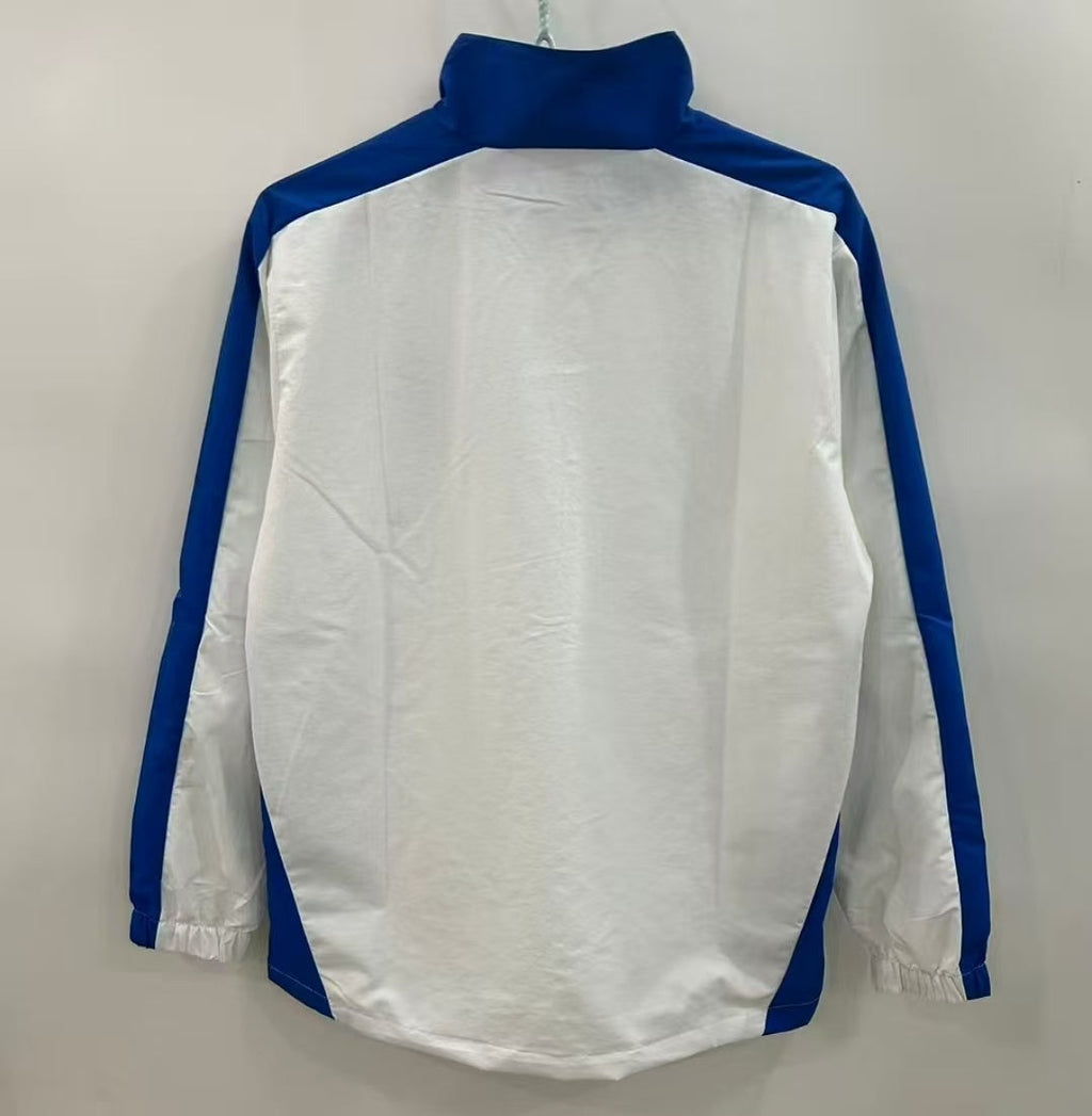Veste coupe-vent réversible Le 12 -ème Maillot, motif Brésil, avec fermeture éclair et capuche, vue de face.