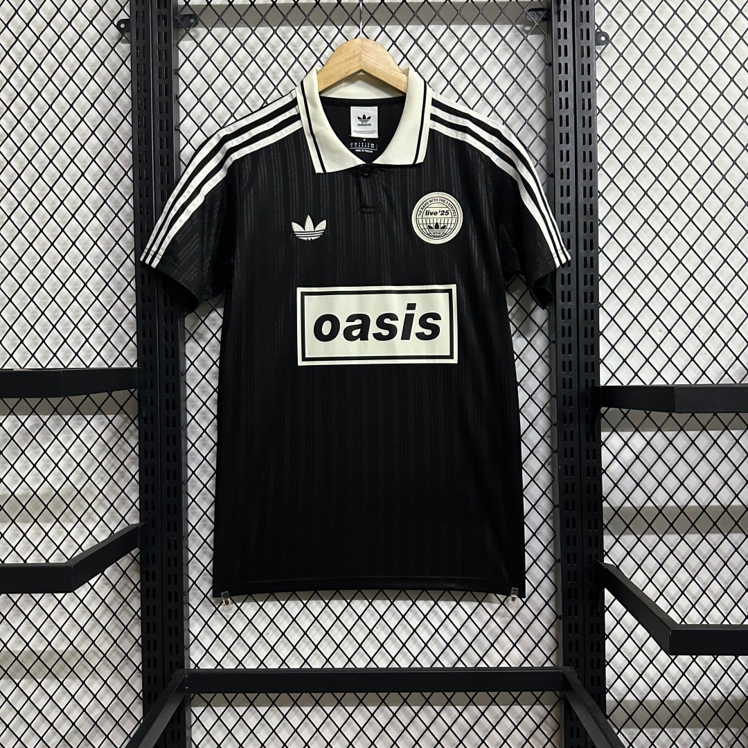 Maillot pour enfants 25/26 ans Le 12 -ème Maillot, modèle Oasis noir, en tissu léger et confortable, vue de face.