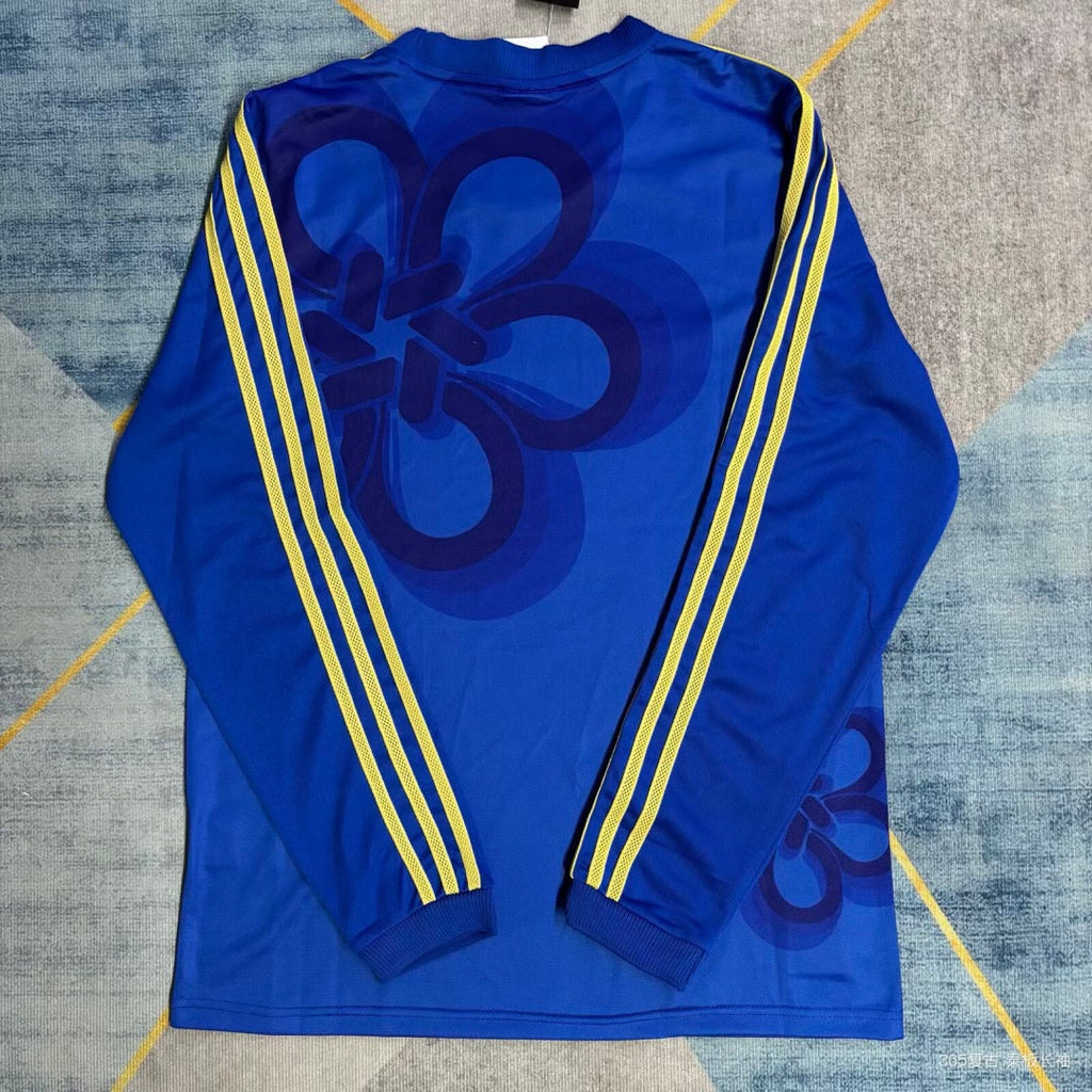Maillot à manches longues Real Madrid 25/26 Le 12-ème Maillot, maillot de football officiel avec logo et design du club.