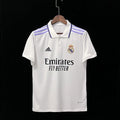 Maillot domicile Real Madrid 2022 2023, marque Le 12 -ème Maillot, vue de face avec logo du club et design blanc et bleu.