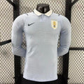 Maillot de football manches longues Uruguay Coupe du Monde 2026 Le 12-ème Maillot, design officiel et logo visible.