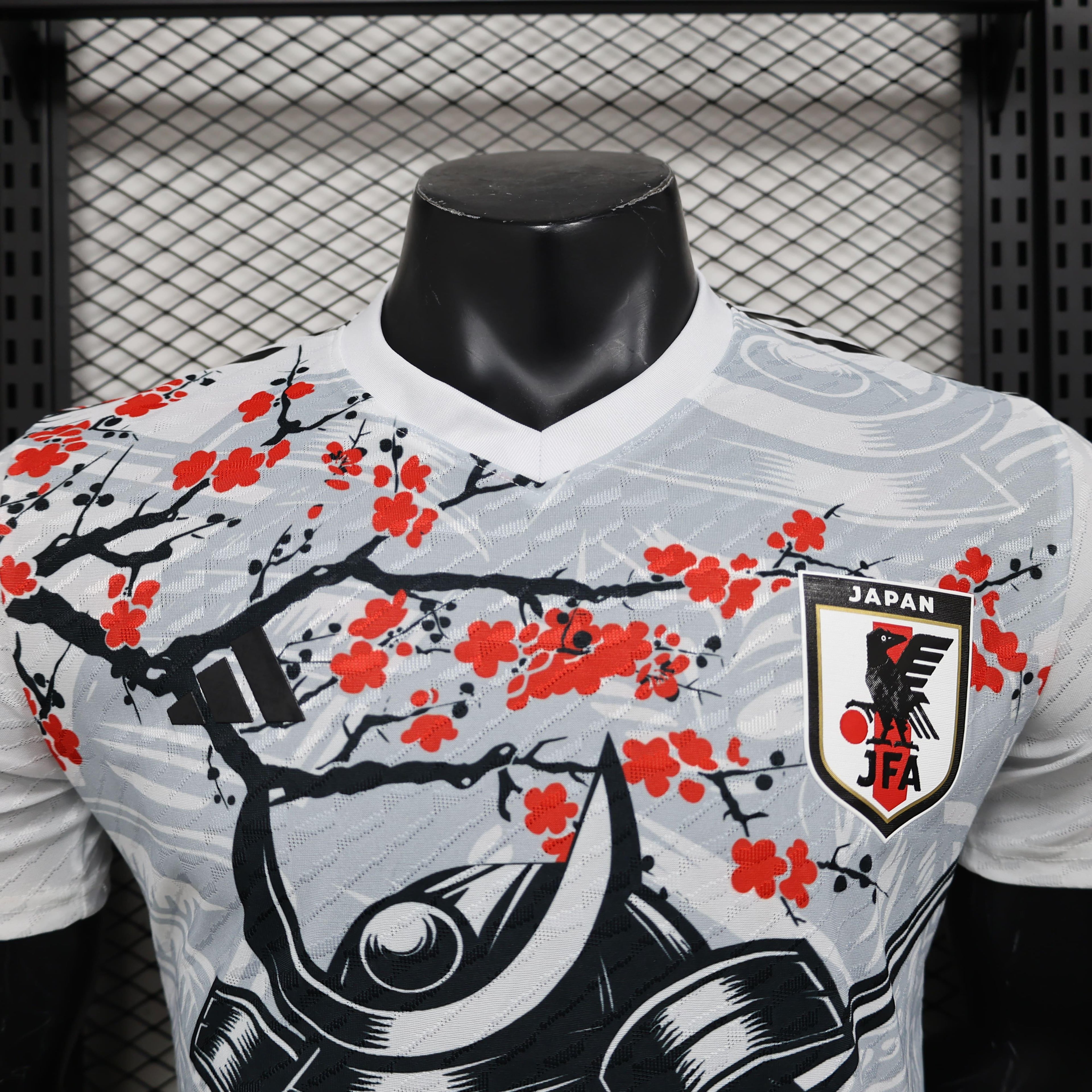 Maillot de football Japon Concept 2025-2026 Le 12 -ème Maillot, maillot bleu avec motifs japonais, vue de face.