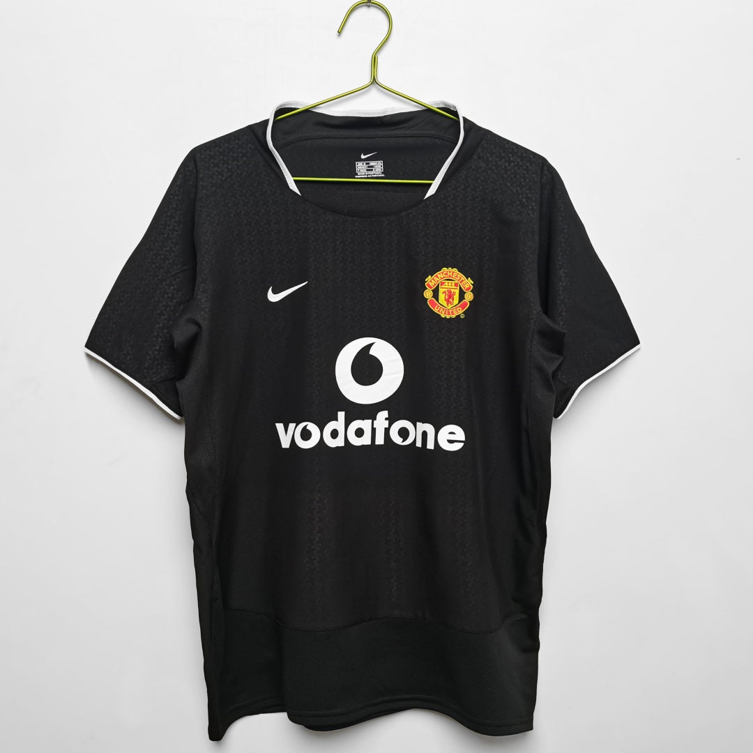 Maillot extérieur rétro Manchester United 2003-2004, marque Le 12-ème Maillot, vue détaillée du maillot de football.