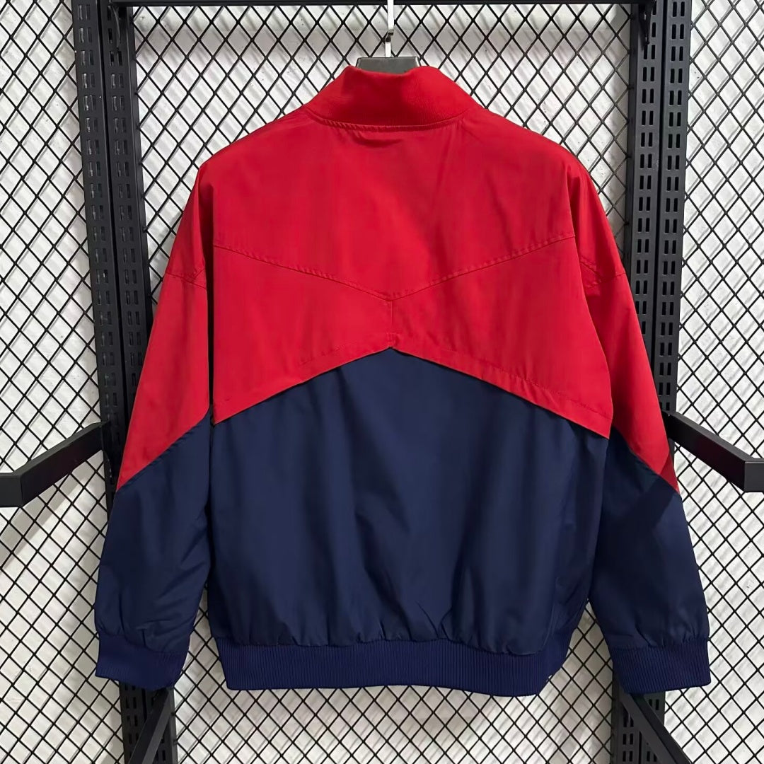Veste coupe-vent réversible Barcelone Le 12 -ème Maillot, tissu léger, design coloré avec logo Barcelone visible.