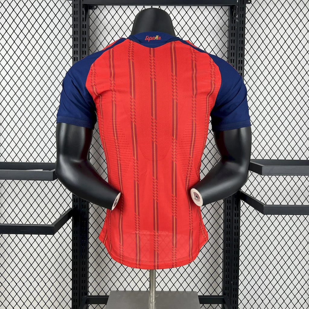 Maillot Espagne Coupe du Monde 2026 Le 12, maillot de football avec logo Espagne, couleurs rouge et jaune, vue de face.