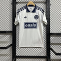 Maillot 25/26 Oasis blanc de Le 12 -ème Maillot, vêtement de sport léger et confortable pour enfants, blanc avec détails de design.