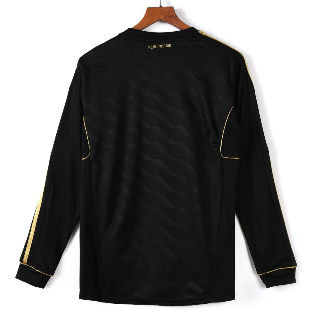 Maillot rétro extérieur Real Madrid 2011-2012 à manches longues, marque Le 12 -ème Maillot, affiché en image.