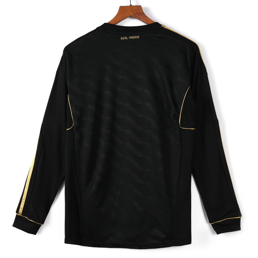 Maillot rétro extérieur Real Madrid 2011-2012 à manches longues, marque Le 12 -ème Maillot, affiché en image.