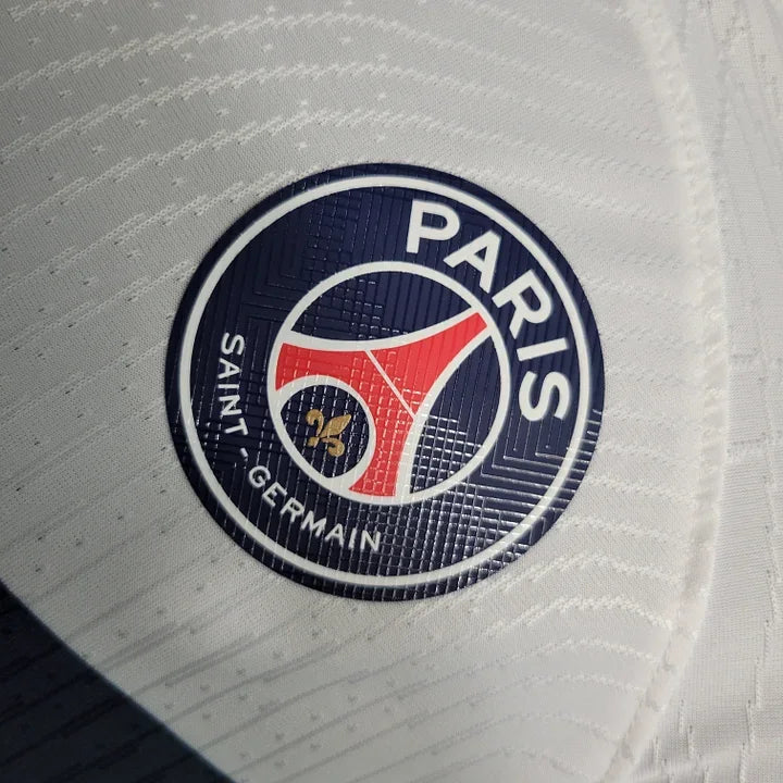 Maillot extérieur Paris 2023-2024 Le 12 -ème Maillot, maillot de football bleu avec logos et détails graphiques.