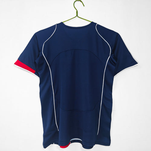 Maillot rétro domicile PSG 2004-2005 Le 12 -ème Maillot, maillot de football vintage avec logo du club et design classique.