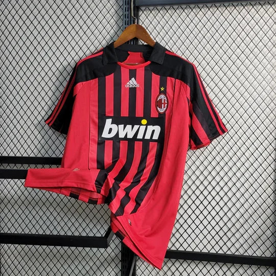 Maillot rétro AC Milan 2007-2008 de Le 12 -ème Maillot, vue de face avec logo et détails de l'équipe sur le maillot.