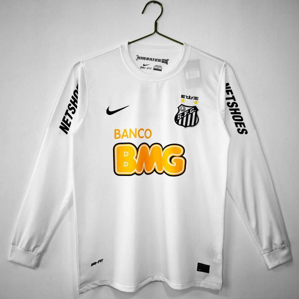 Maillot à manches longues Santos rétro 2011/2012, marque Le 12 -ème Maillot, en tissu bleu avec logo et détails vintage.