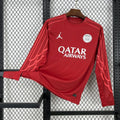 Maillot manches longues PSG rouge de la marque Le 12 -ème Maillot, vue de face avec logo et détails du design rouge.