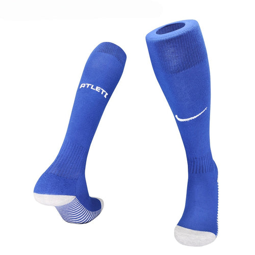 Chaussettes domicile de l'Atlético Madrid, marque Le 12-ème Maillot, avec couleurs officielles et logo de l'équipe.