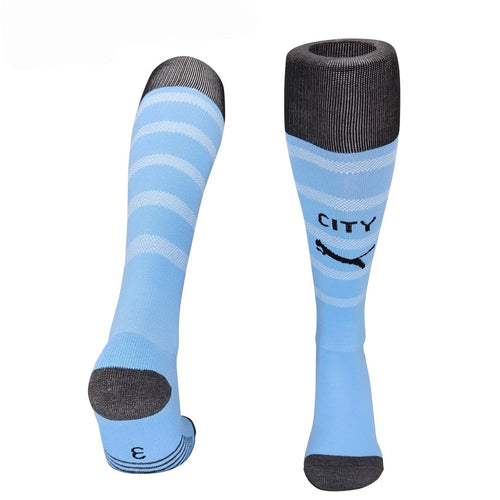 Chaussettes Manchester City Domicile Le 12 -ème Maillot, bleu avec logo du club et détails blancs, pour supporter.